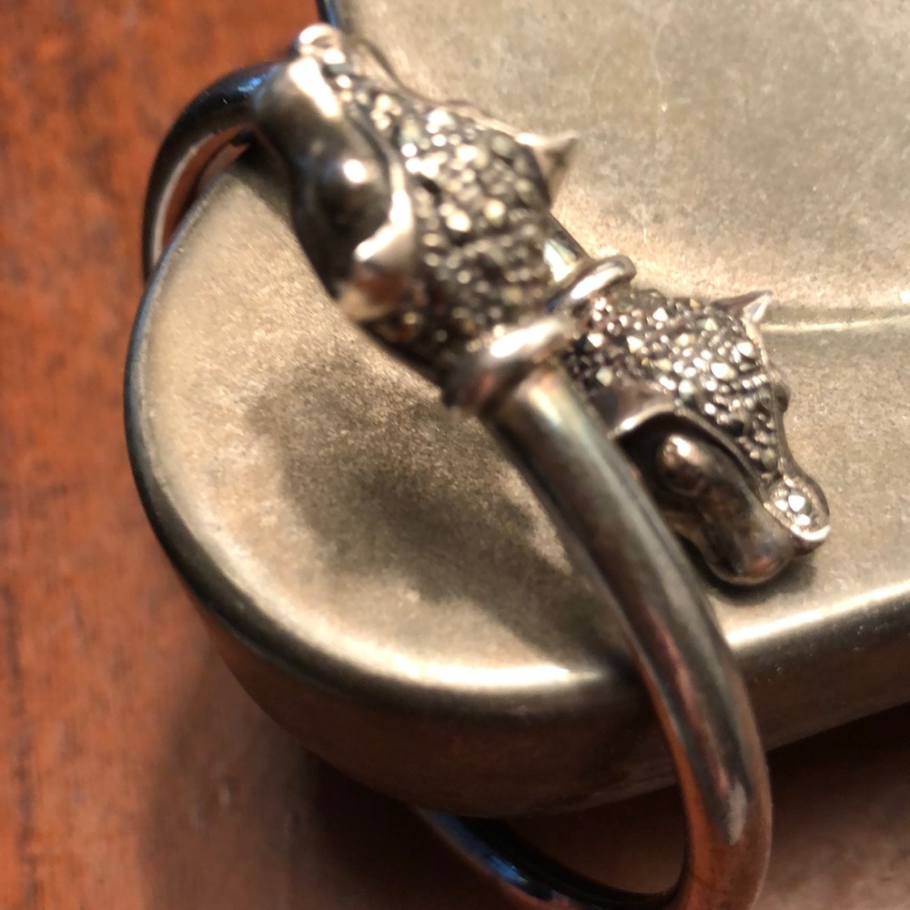 Silver burnished bangle bracelet with dragon heads and marcacite stones